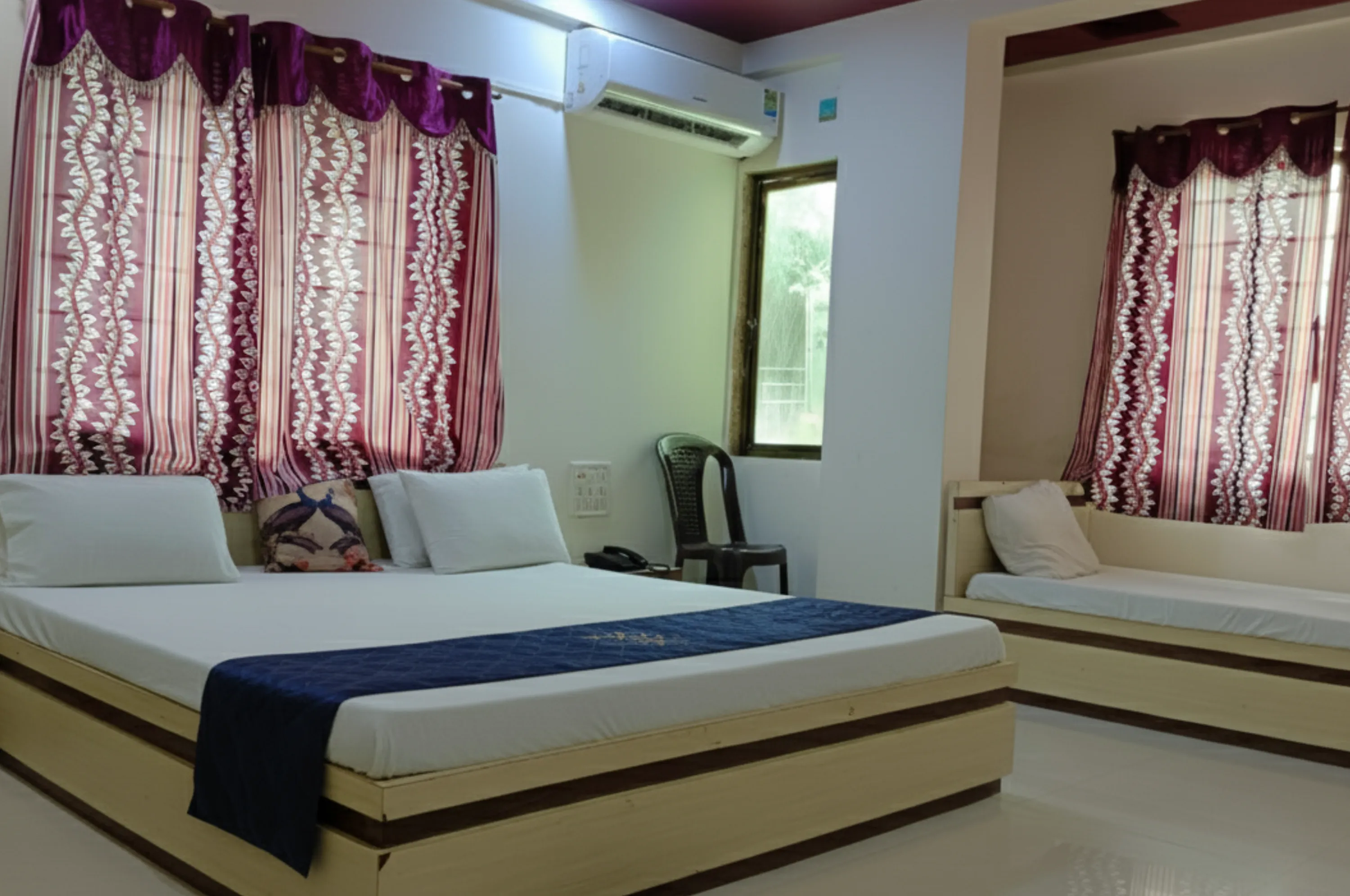 Comfortable Triple Bed Accommodation at Hotel Shivsadan Somnath